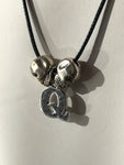 Q Necklace with Skeletons
